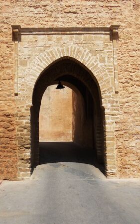 Rabat doorway, an arched doorway through the city wall into the medina, Rabat, Moroccoの写真素材