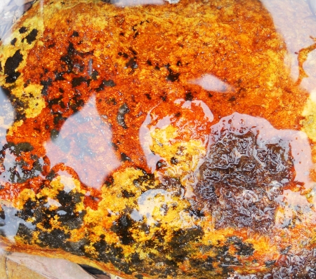 rock abstract 6, a dramatic abstract of a rock surface in bright vermillion, orange and yellow, の写真素材