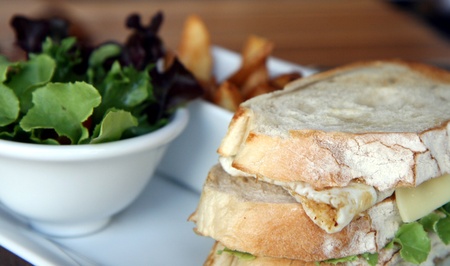 sandwich, a double-layered cheese and salad sandwich with side-dishes of salad and potato wedgesの写真素材