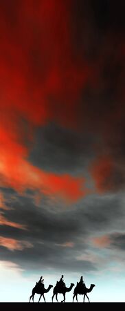 3 kings sunset 20b, Christmas card image of the 3 kings on camels, silhouetted against a dramatic sunsetの写真素材