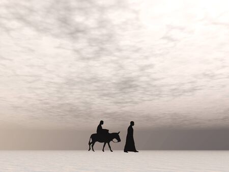 Christmas Mary and Joseph 7, Christmas card image of Mary and Joseph silhouetted against a pale sky with misty horizonの写真素材