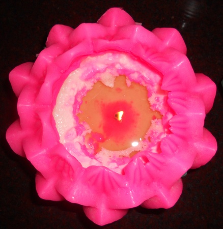 pink lotus candle, a candle in the shape of a pink lotus flower, in a Chinese temple, Penang, Malaysia, Asiaの写真素材