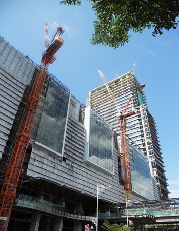 Skyscraper construction 5, cranes working on the contruction of a modern skyscraper, Kuala Lumpur, Malaysia, Asiaの写真素材
