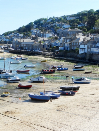 Cornish harbour 2, Small harbour in Cornwall  UK  with small fishing boats and villageの写真素材