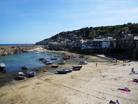 Cornish harbour, Small harbour in Cornwall  UK  with small fishing boats and villageのeditorial素材