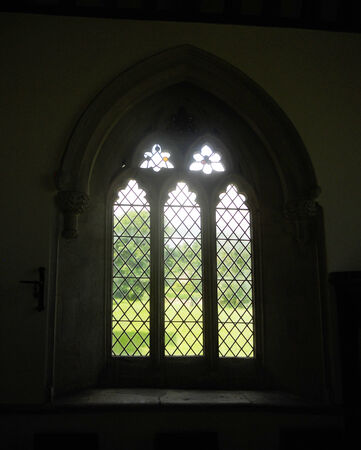 ancient church window 5, small church window in a 12th Century Church interiorの写真素材