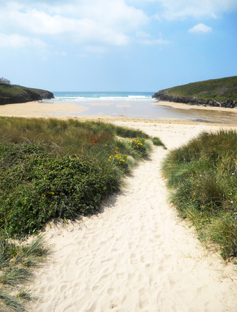 Cornish beach 9, small sandy beach and distant sea, Cornwall, UKの写真素材
