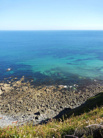 Cornish coast 4, View of sea and rocks from the edge of a cliff, Cornwall, UKの写真素材
