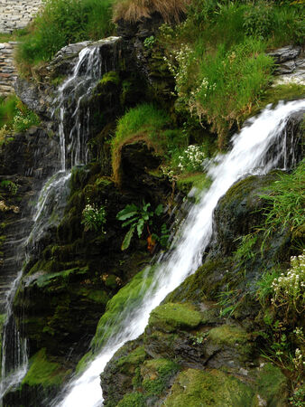 waterfalls 2, 2 small waterfalls on a cliff, Tintagel, Cornwall, UKの写真素材