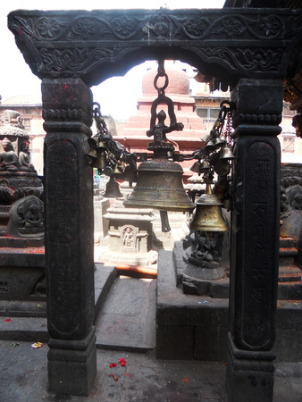 Nepalese bell stand, large bell on a wooden stand, Kathmanduの写真素材