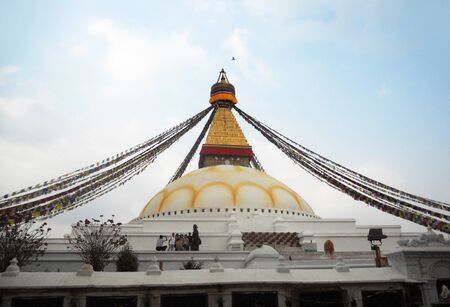 Nepalese temple 9, Bhodnath temple in Kathmandu with prayer flagsのeditorial素材