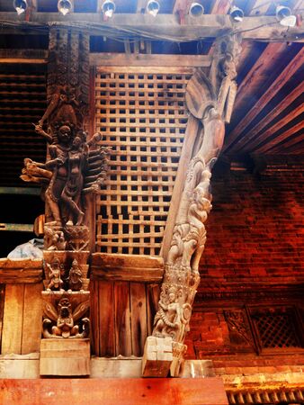 Nepalese temple carvings, carved wood in a temple in Kathmanduの写真素材