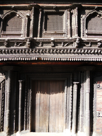 Nepalese woodcarving, closeup of carved wood on Nepalese architectureの写真素材