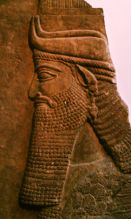 Ancient carving, bass-relief carved from stone, middle-easternの写真素材