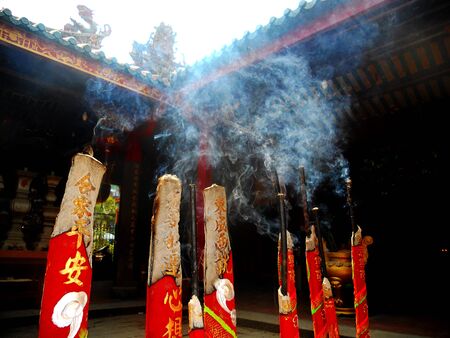 large  incense sticks burning in a Chinese templeのeditorial素材