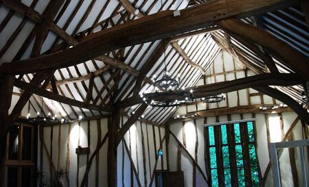 interior of beamed roof of Tudor building, UKの写真素材