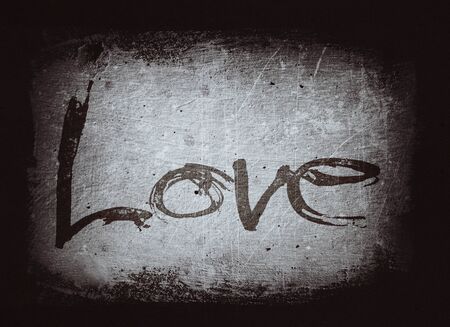 love painted, the word love hand-painted, artistic word love, stylized design element, black and gray grunge texture with dark vignette.の写真素材