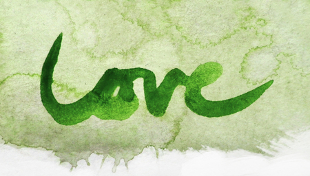 love painted, the word love hand-painted, artistic word love, brush lettering on watercolor background, green tint.の写真素材
