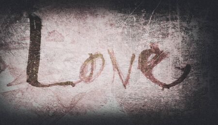love painted, the word love hand-painted, artistic word love, brush lettering on grunge texture, dark vignette.の写真素材