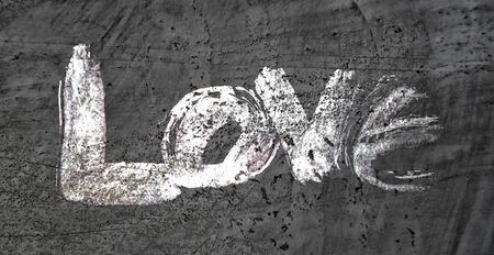 love painted, the word love hand-painted, artistic word love, rough brush lettering on grunge texture background.の写真素材