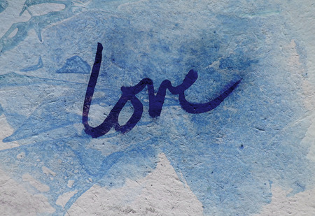 love painted, the word love hand-painted, artistic word love, blue brush lettering on blue painted...