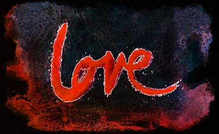 love painted, the word love hand-painted, artistic word love, rough painted brush lettering on grunge texture, orange tints and black backgroundの写真素材