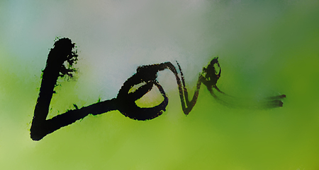 love painted, the word love hand-painted, artistic word love, rough brush lettering with indian ink running on wet painted grunge texture, blurred background.の写真素材