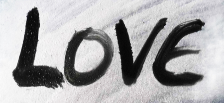 love painted, the word love hand-painted, artistic word love, rough painted brush lettering in grays on rough painted texture.の写真素材