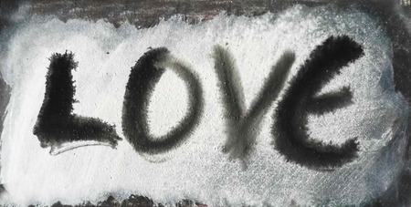 love painted, the word love hand-painted, artistic word love, wet gray painted brush lettering on wet gray painted background texture.の写真素材