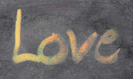 love painted, the word love hand-painted, artistic word love, orange tinted rough brush lettering in wet paint on gray painted texture.の写真素材