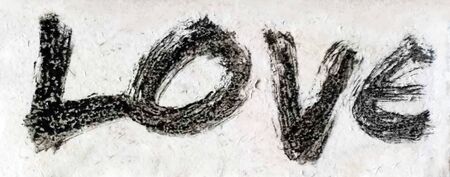 love painted, the word love hand-painted, artistic word love, rough painted brush lettering on white textured background.の写真素材