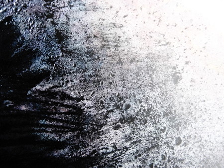 Diagonal gradation of charcoal texture on rough board, ideal for artistic background textured...