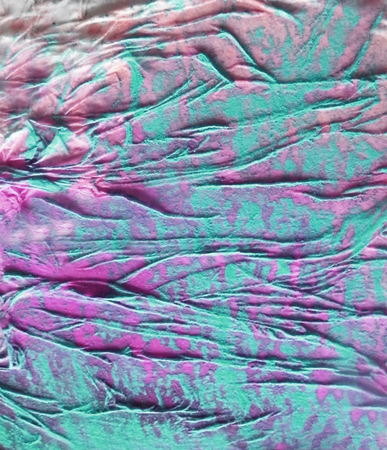 Organic texture, with paint and pastels, made by glue crumpled tissue on painted board, cyan or turquoise and magenta.の写真素材