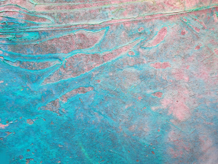 Organic painted texture with fascinating organic forms and textures from pigment drying under wrinkled plastic, cyan or turquoise and pink tints.の写真素材