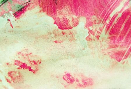 Artistic texture background with rough dry paint brush strokes on paper, random marks, red and green.の写真素材