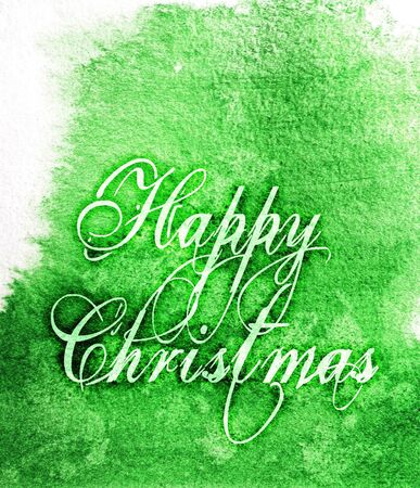 Happy Christmas, a contemporary Christmas card with the words Happy Christmas in a beautiful font, on a watercolor texture background, green tints.の写真素材
