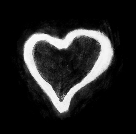 Rough painted heart-shape with dark outline on painted and drawn background. Black and white.の写真素材
