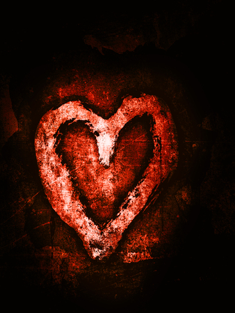 Rough painted heart-shape with dark outline on painted concrete background.の写真素材