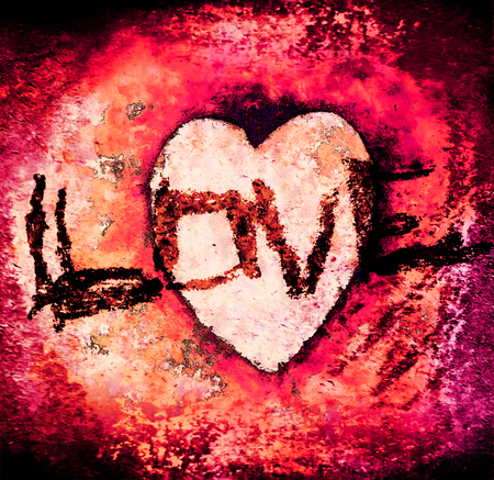 Rough grunge love concept, the word love roughly sketched and a rough heart-shape, on painted grunge texture, orange, magenta and black.の写真素材