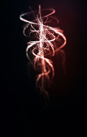 Beautiful flame fractal reminiscent of the serpent pharmacy symbol, tinted and blur vignette.の写真素材