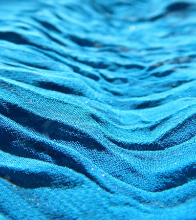 Rumpled blue fabric.の写真素材