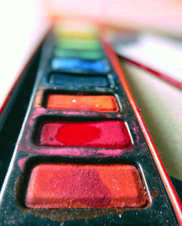 End view of a used box of watercolor paints.の写真素材