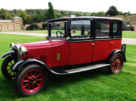 An old vintage car, red and black.の写真素材