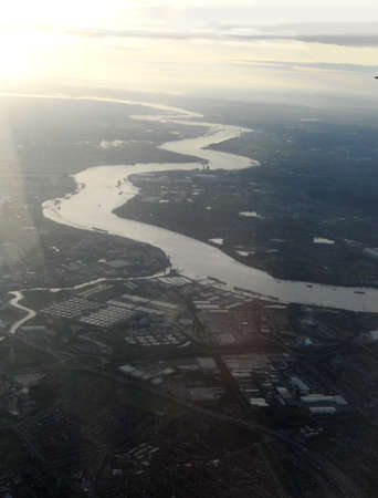 Sunrise over the River Thames near London, from the air.