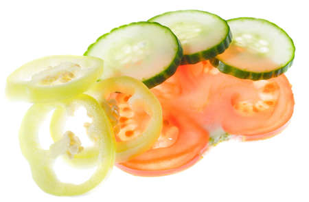 Sliced fresh vegetables - tomato, cucumber, pepperの写真素材