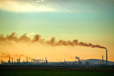 A large oil factory, liberating lots of toxic smokeの写真素材