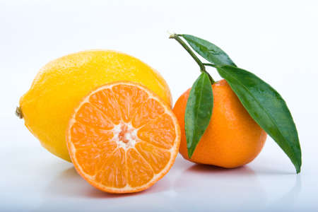 Mandarin and lemon on whiteの写真素材