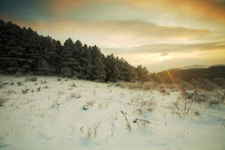 Colorful sunset in the mountainsの写真素材