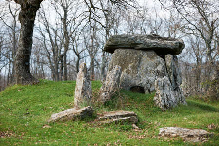 Ancient Thracian Dolmen stone-built tomb in oak forest near Edirne city, Turkeyの写真素材
