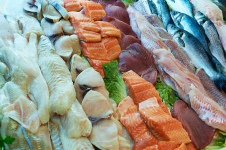 Fresh mediterranean fish fillet on sea food market stall for sale in Provence, Franceの写真素材